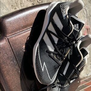 Adidas Adizero Afterburner 7 baseball cleats in black and white